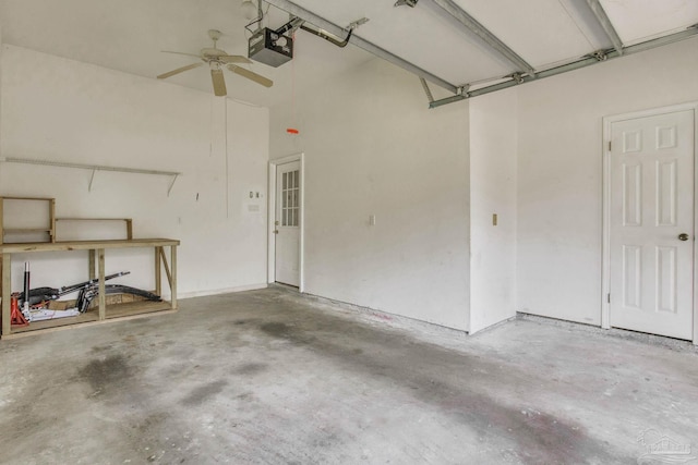 garage with a garage door opener and ceiling fan