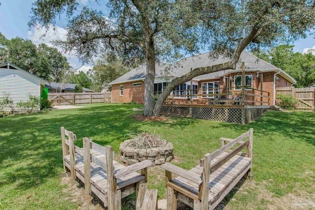 view of yard featuring a wooden deck