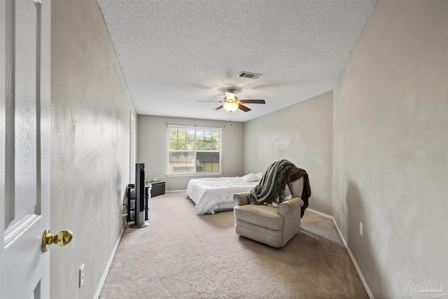 8187 Lode Star Ave, Pensacola, FL 32514 - carpeted bedroom with a textured ceiling, baseboards, and a ceiling fan