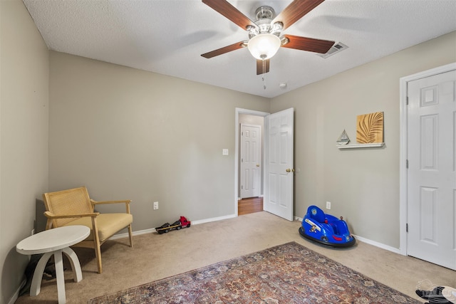 8187 Lode Star Ave, Pensacola, FL 32514 - living area with carpet flooring, ceiling fan, and baseboards