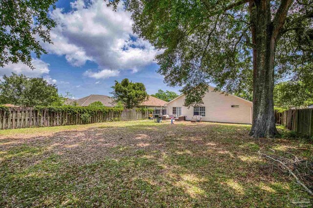 8187 Lode Star Ave, Pensacola, FL 32514 - view of yard with a patio area