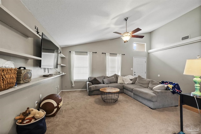 8187 Lode Star Ave, Pensacola, FL 32514 - carpeted living room featuring vaulted ceiling, a ceiling fan, and baseboards