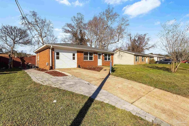 single story home featuring concrete driveway, brick siding, a front lawn, and fence