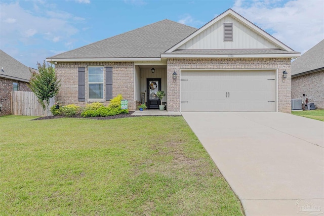 8104 Marian Ln, Pensacola, FL 32526 - view of front of house featuring brick siding, concrete driveway, an attached garage, and central air condition unit
