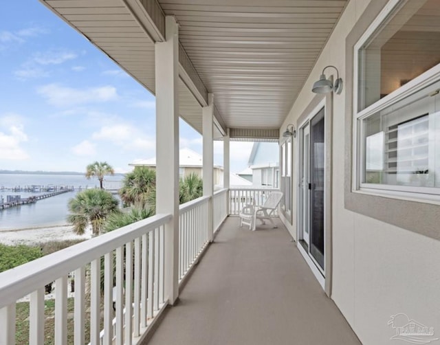 balcony featuring a water view