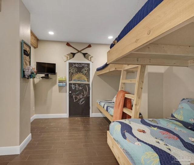 bedroom featuring dark wood-type flooring