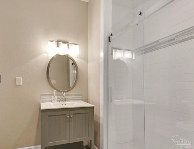 bathroom featuring vanity and walk in shower