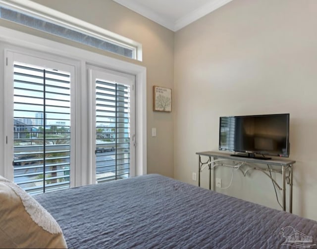 bedroom with crown molding