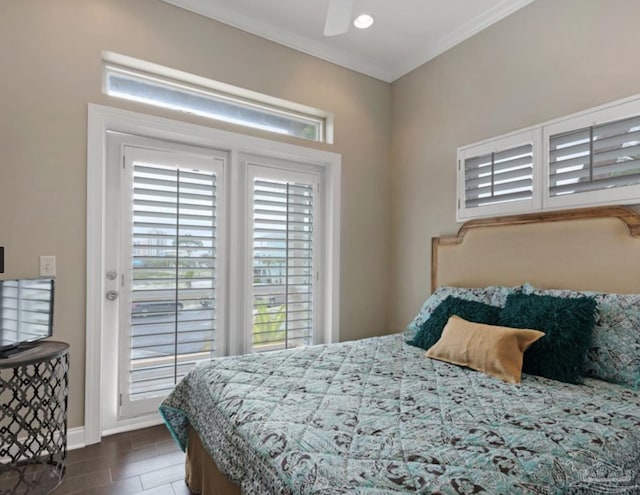 bedroom featuring ceiling fan and ornamental molding