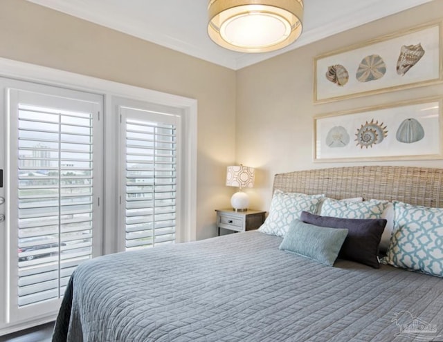 bedroom featuring crown molding