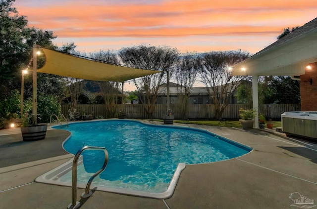 pool at dusk with a patio and cooling unit