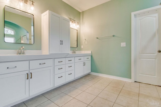 bathroom with vanity and tile patterned floors