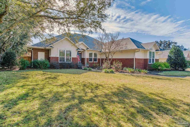 single story home with a front yard