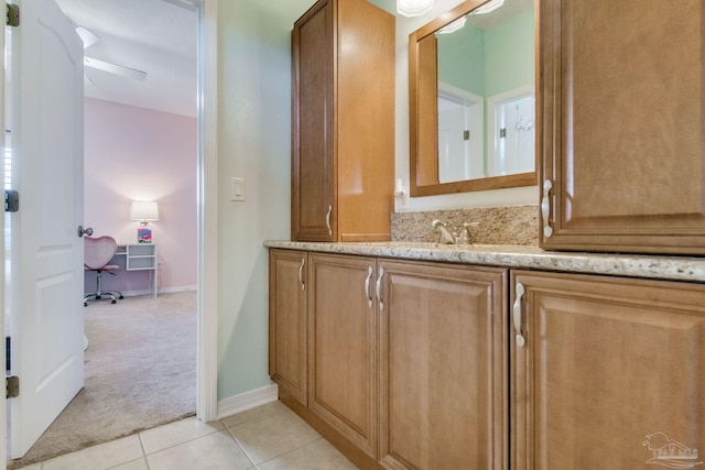 bathroom with vanity, tile patterned floors, and ceiling fan