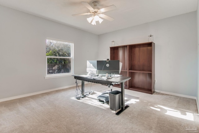 office with ceiling fan and light carpet