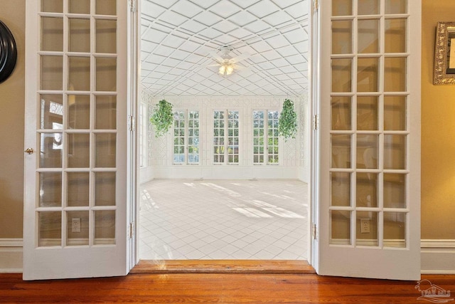 doorway to outside featuring wood-type flooring