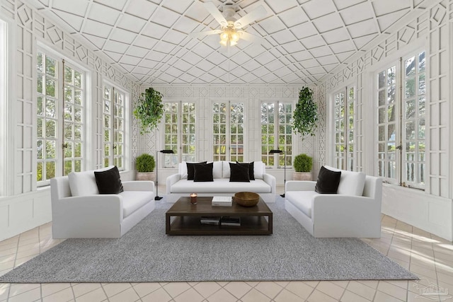 sunroom / solarium with ceiling fan