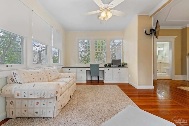 sunroom with a wealth of natural light and ceiling fan