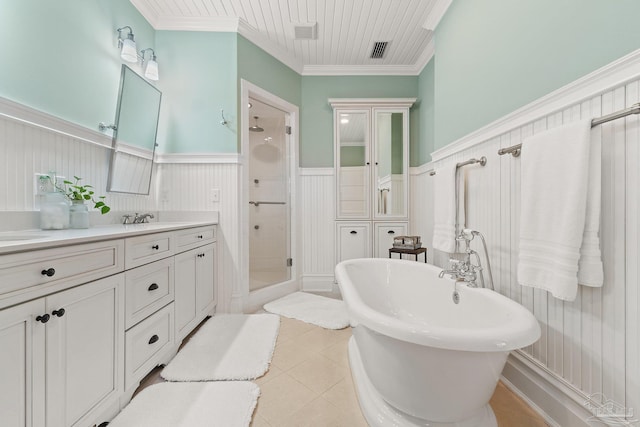 bathroom with independent shower and bath, tile patterned floors, crown molding, and dual bowl vanity