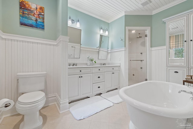 bathroom with ornamental molding, tile patterned flooring, dual bowl vanity, and toilet