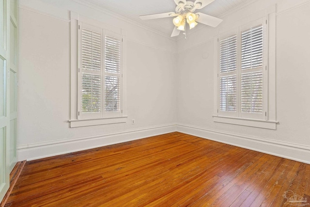 unfurnished room featuring ornamental molding, hardwood / wood-style flooring, and ceiling fan