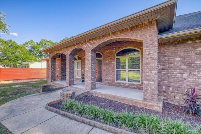 doorway to property with a patio