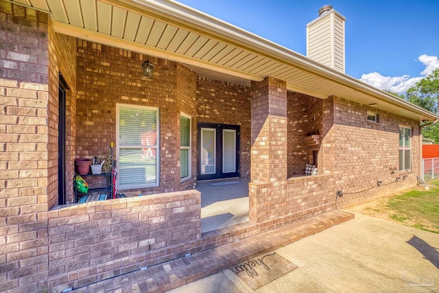 entrance to property with a patio area