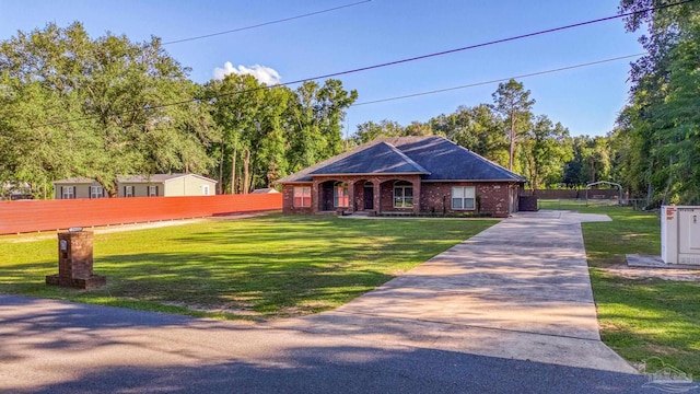 ranch-style house with a front yard