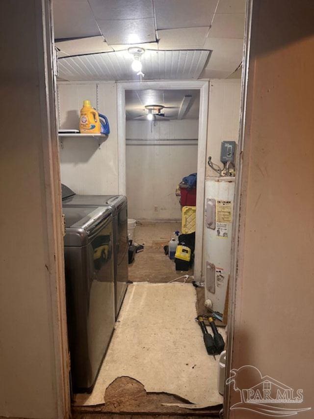 laundry area featuring washer and clothes dryer and water heater