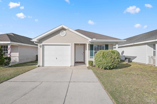 ranch-style house with a garage and a front lawn