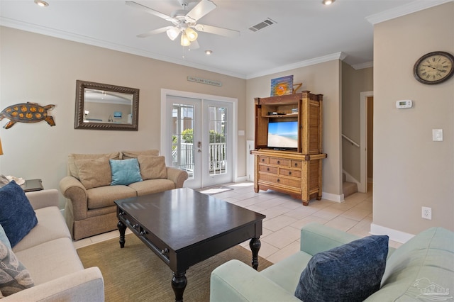 tiled living room with ceiling fan, ornamental molding, and french doors