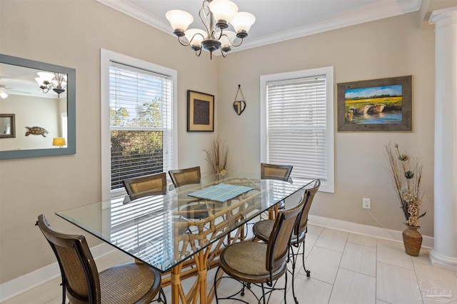 tiled dining space with ornamental molding, a chandelier, and ornate columns