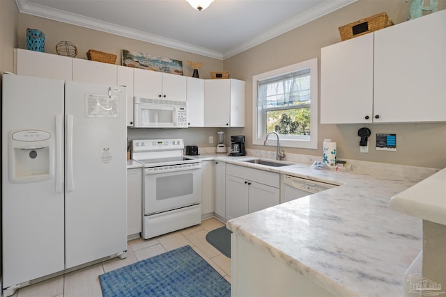 kitchen featuring white cabinets, light tile patterned floors, white appliances, sink, and ornamental molding