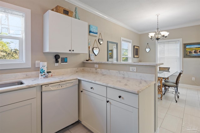 kitchen with a wealth of natural light, dishwasher, an inviting chandelier, and white cabinetry