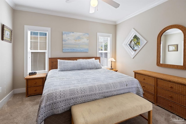 bedroom with ceiling fan, carpet, and ornamental molding