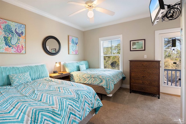 carpeted bedroom featuring ornamental molding, access to exterior, and ceiling fan