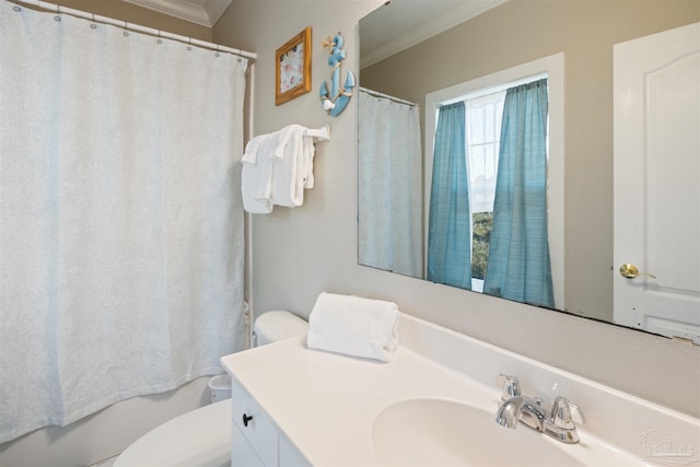 full bathroom featuring crown molding, vanity, toilet, and shower with separate bathtub