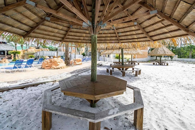 view of home's community with a patio area, a pool, and a gazebo