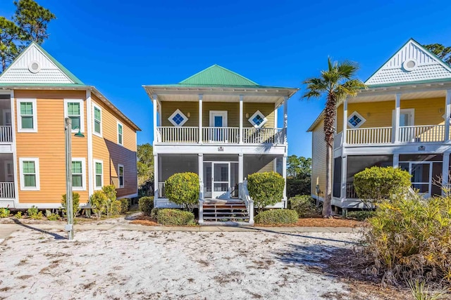 view of front of property with a balcony