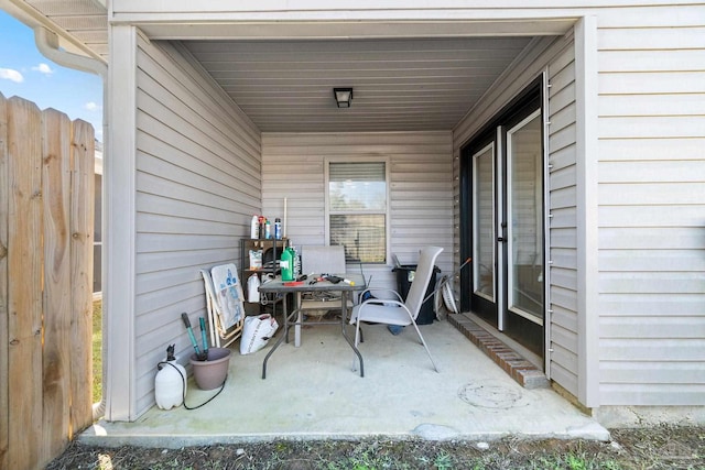 view of patio / terrace featuring fence