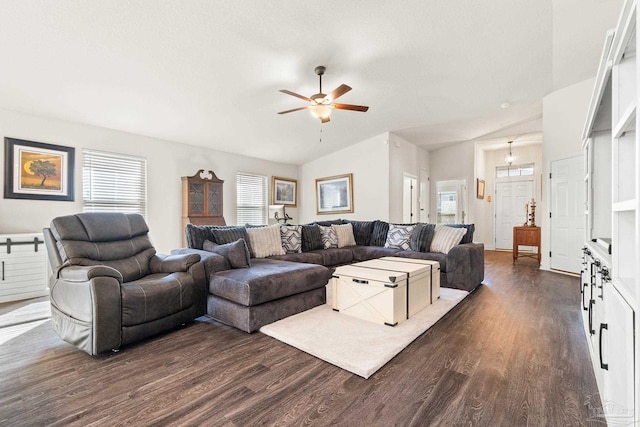 living room featuring a ceiling fan, dark wood finished floors, and lofted ceiling