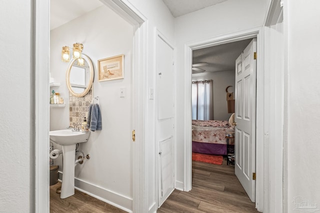 bathroom featuring hardwood / wood-style flooring