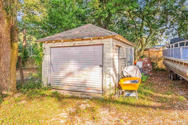 view of outbuilding with a garage