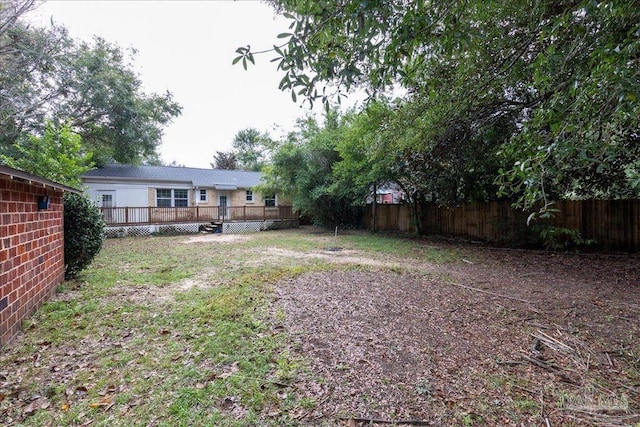 view of yard with a deck