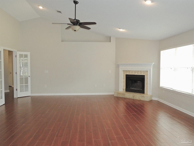 4814 Belvedere Cir, Pace, FL 32571 - unfurnished living room with a ceiling fan, a high end fireplace, wood finished floors, high vaulted ceiling, and french doors