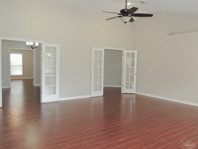 4814 Belvedere Cir, Pace, FL 32571 - empty room with french doors, high vaulted ceiling, a chandelier, ceiling fan, and dark wood-type flooring