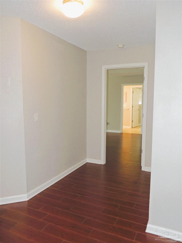 4814 Belvedere Cir, Pace, FL 32571 - empty room with wood finished floors and a textured ceiling