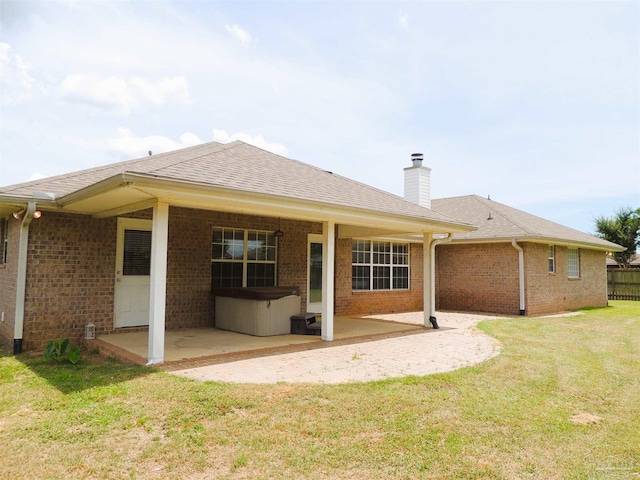4814 Belvedere Cir, Pace, FL 32571 - back of house featuring a patio, brick siding, a chimney, and roof with shingles