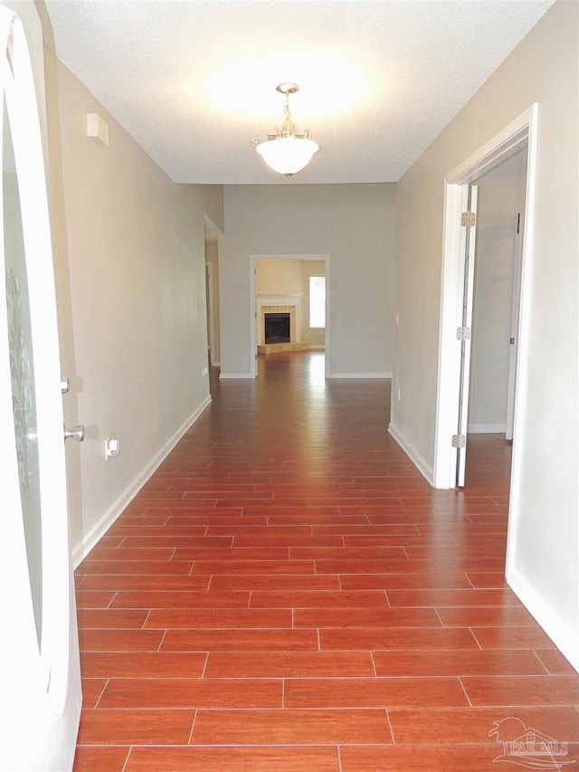 4814 Belvedere Cir, Pace, FL 32571 - hallway featuring wood finished floors and baseboards