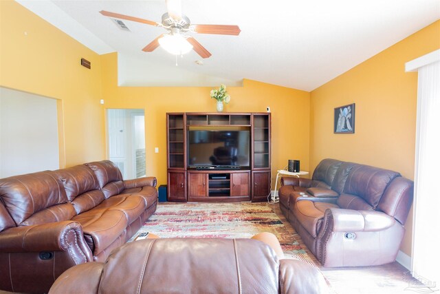2546 Stormy Cir, Navarre, FL 32566 - living area with visible vents, a ceiling fan, and lofted ceiling